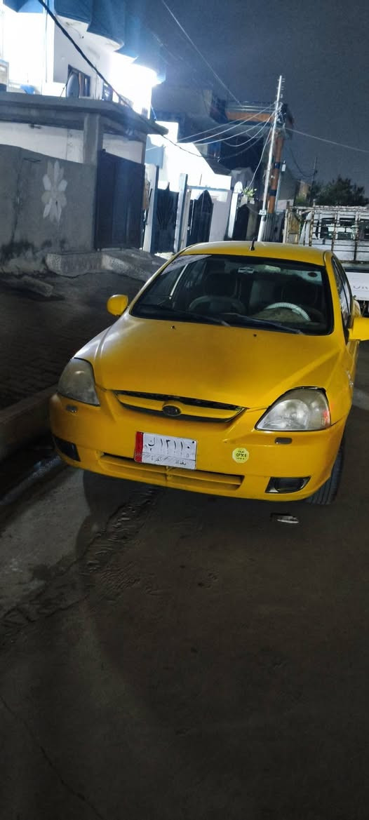 سلام عليكم سياره جديده جديده كيه موديل 2003 كير محرك اوتوماتيك تدف شغاله دفتر بانزين بيها هيه غرامات امصفره رقم بغداد سياره حلوه مال جناي السعر35وبيه مجال لاستفسار ***********
