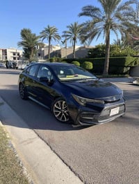 كورلا 2021 SE معوقين لل28 تنفك محرك 2000  كير 10نمر موصفات  كامره شاشه...