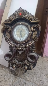 ٢ كناتير • ساعة قديمة