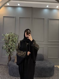 عباية رگلان • آماراتية سوداء • فري سايز ٥٠-١٠٠كيلو