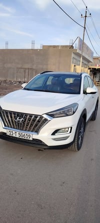 توسان مديل 2020  رقم بغداد انكليزي   سياره مكفوله كفاله عامه  فول موصف...