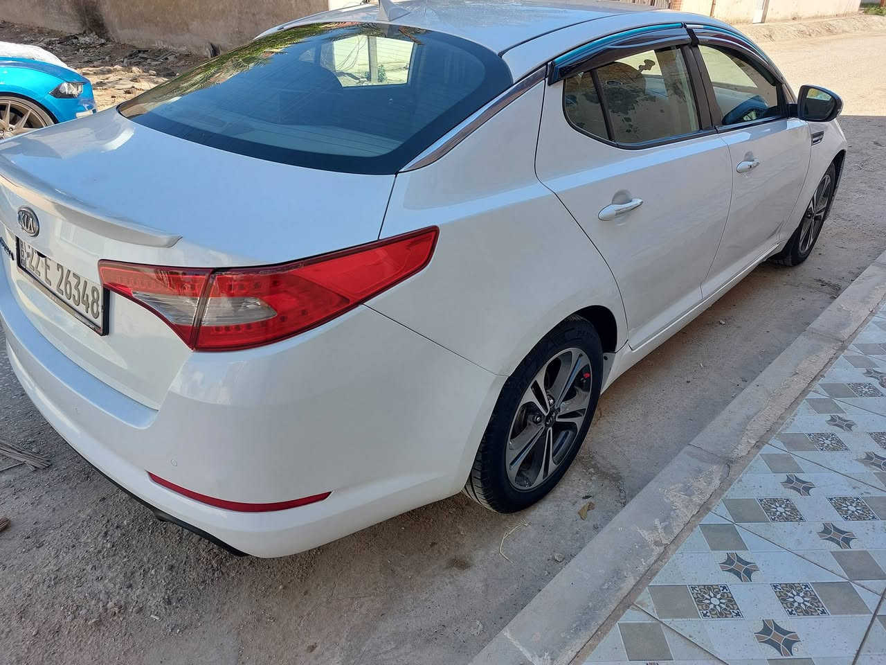 السلام عليكم لبيع اوبتماء موديل 2012 خليجي مكينه دوش  بيهه مكانين بارد فقط الباقي كفاله عامه من الصبغ والضربه كير محرك حداديه مكفولات تخم تايرات جداد كهربائية كلهه شغاله سياره جاهزه من كلشي السعر 120 وبيهه مجال بسيط مكاني بابل ***********
