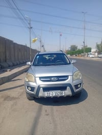 عليكم سيارة سبورتج 2009 رقم بغداد انكليزي بسمي وتحويل ثاني يوم شرط سيا...
