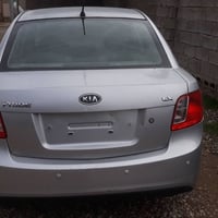 كيا ريو ادوات موديل 2011 جديده كارتون السعر ٣٧ وبيها مجال ٠٧٨٠٦٠٠٢٩٤٦