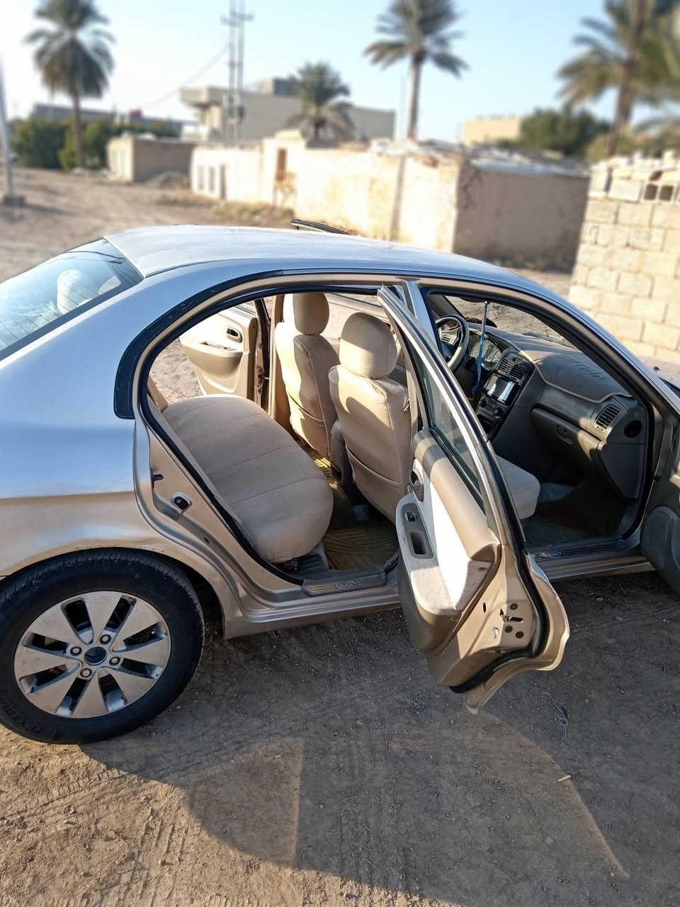 كيا اوبتيما موديل 2005نظيفه حيل وحلوه وخير من الله تدفىه تبريد ويه السويج رقم انكليزي الجديد هزه جديده تخم تايرات جديد بيه جراد بالبنيد  والقماره سنويه 2027 الشراي يتصل على الرقم *********** السياره موجوده بالكوت عارضه ب75 وبيه مجال بسيط واني بخدمتكم
