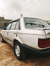 مازدا 323 موديل 86 للبيع او مراوس   كير  مكينه جدد اوتماتيك كهربائياته...