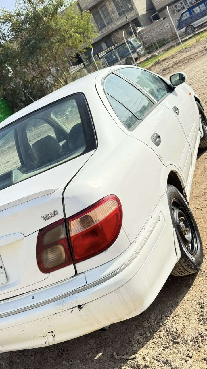 سلام عليكم نيسان سني 2001 رقم بغداد  كير وتو كير  بلادي ما محور  تخم تاير جديد مكان بغداد سعر 55 وبيها مجال تصال ***********
