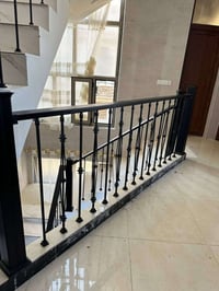 حدادة ولحام • أبواب وشبابيك • مظلات وسلالم