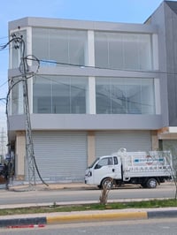 بناية تجارية • ١٠٠م • حي الزيتون