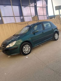 بيجو ٣٠٧ • ٢٠٠٥ • شاشة آيباد