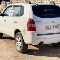 توسان ٢٠٠٩ • مكينة ٢٠٠٠ • كشنات جلد