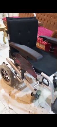 عربة معوقين كهربائية