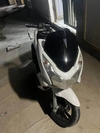 دراجة PCX دراجة نضيفة مبدل بيها بس كفر اصلي السعرمليون و٢٠٠ وبيها مجال...