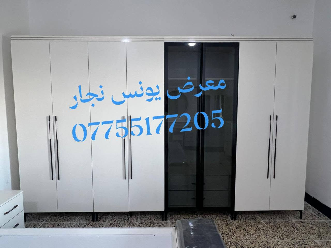 العنوان كركوك مقابل دوميز معرض يونس نجار ***********
