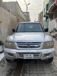 باجيرو ٢٠٠١ • لوحة إنكليزي ٢٩ دهوك • صبغ بسيط بالمصد الخلفي