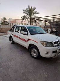 هايلوكس ٢٠١١ مكفول من الصبغ  رقم بغداد انكليزي بسمي  كير عادي مكان بغد...