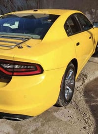 سيارة جارجر للبيع  موديل ٢٠٢١  رقم بغداد  فئة sxt plus تو ويل  حادثهه ...