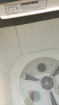 غسالة ملابس • مجفف عاطل • النجف