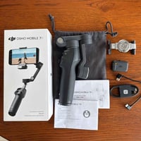 DJI OSMO MOBILE 7P  قطعة نظافة 99‎%‎ فقط نقص الفلاش وبسعر مناسب  مكاني...