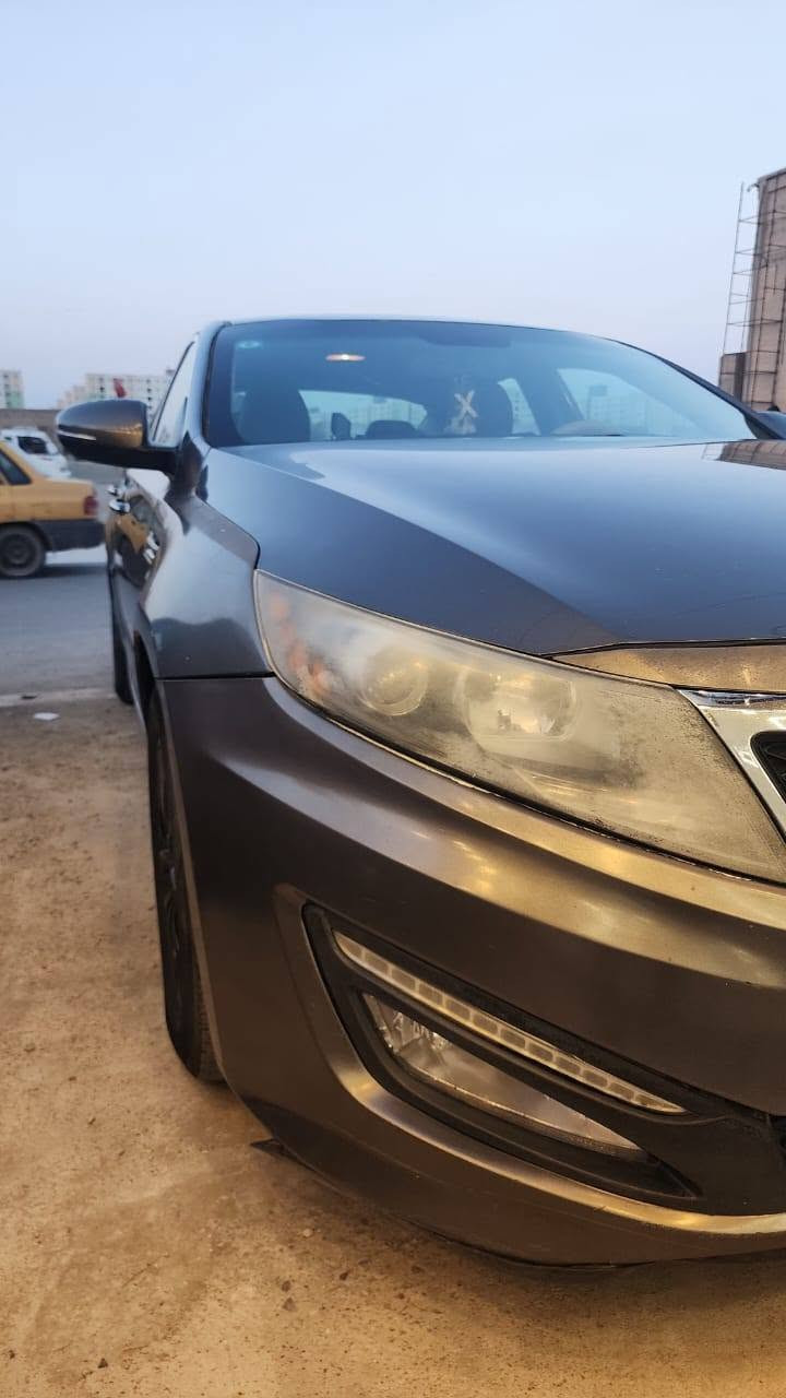 كيا اوبتما موديل 13امريكي محرك 2400GDI سياره كير محرك جديد  مكفول نص فول حادثه جاملغ وصندوق بدون إرباك  ماشيه144 مايل . مكان سياره بغداد  للتواصل الاتصال فقط. ع رقم ***********
