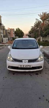 نيسان تيدا موديل 2007 رقم بغداد دولي بأسمي . كير محرك نضيفات /محرك 180...