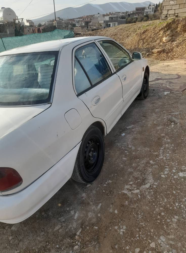 پرۆتۆن مۆدێل 2002 سەنەویە 
 گيروومةكينةي مةزبووتة
 تةقةورةقةي نية
*********** السليمانية, العراق
