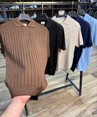 متابعة • البيج • ملابس