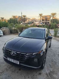 توسان 2024 وارد امريكي بلكن نظام ( شحن منزلي + هايبرد + بانزين )   سيا...