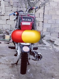 دراجة نارية • موديل 23 • محرك ما مفتوح