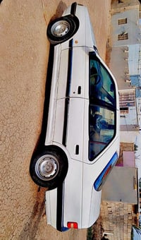 بيجو ٤٠٥ • ٢٠١٠ • رقم نجف ٣٣