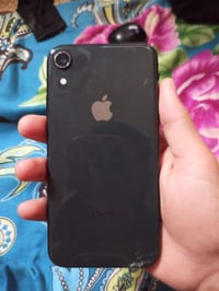 ايفون اكس ار • ذاكرة ٦٤ • بطارية ١٠٠