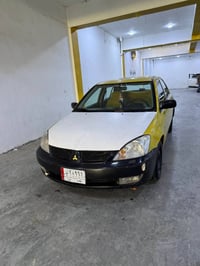 لانسر • ٢٠١٠ • جير عادي