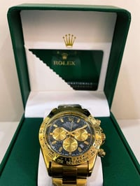 رولكس دايتونا مختومة ذهب عيار 18  مختمة من كل مكان وزن ثقيل سناتر شغال...