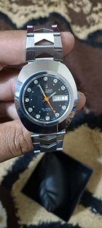 ساعه نوع البار سويسري اصليه نضافه 99بالميه نضام اوتوماتيك منفذ شهري وي...