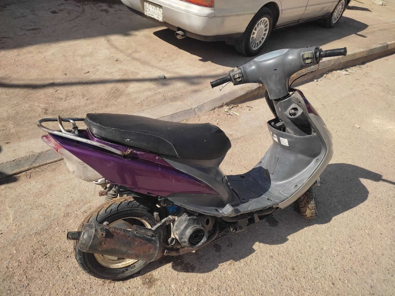 دراجة كاطعة نار ابيع كوم حديد محرك 55 مكفول اذا بي شي ناصرية مدينة رقمي ‏‪***********‬‏
