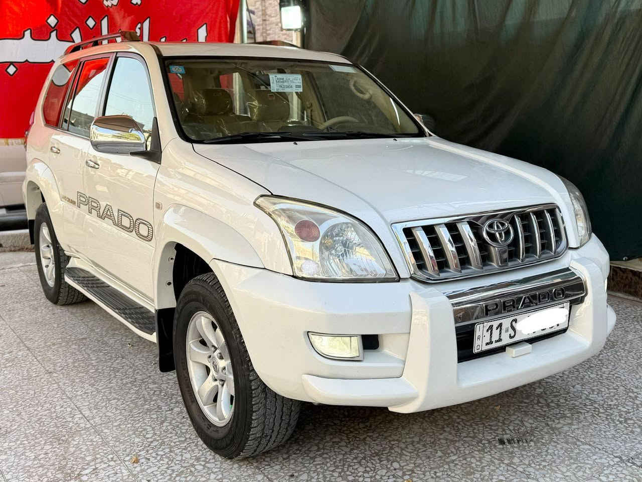 السلام عليكم ورحمه الله وبركاته.                  برادو موديل 2007 للبيع فقط وليس للمراوس.                                             فول مواصفات VX.   كويتي    اعلى فئه 1/1.          مكينه 6/سلندر      7 راكب.  فتحه سقف.    تحكم ستيرن               كشنات جلد.  كشنات كهرباء جهتين                  فور ويل  سبير تعليك دبل تانكي.                داخل صاج 3قطع تبريد ثلاجه   جام اوتوماتيك                منضومه LED عالي.    ناصي هوك خلفي.        شاشه كامره ايباد      وبعد بيها هواي مواصفات معروفة مواصفات.      الفول   كير مكينة  صدر تخم تاير كله جديد مابيها اي نقص.                        رقم بغداد الإنكليزي الجديد بسمي سنويه جديده العنوان بغداد الإتصال على الرقم *********** بغداد, العراق
