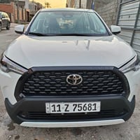 كورلا كروز للبيع 2025 ماشية 6900 رقم بغداد حره بأسمي  السياره كفاله عا...