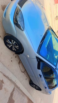 لانسر موديل 2006رقم صلاح الدين السياره برغي مامفتوح بيها جديده أي نقص ...