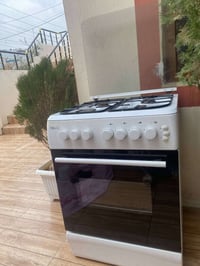 طباخة ٤شعلة • نيوال • مستعمل خفيف