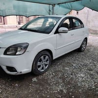 كيا ريو ٢٠١١ • رقم أربيل • مكينة ١٫٤ اوتوماتيك