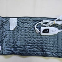 وسادة تسخين • تخفيف آلام الظهر • توصيل بغداد