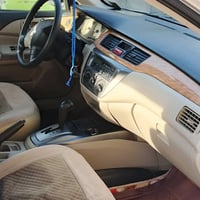 لانسر موديل 2010 جديد عد صبغ قطعتين بنيد وجاملغ سيارة حلوه ونصيفة ماشي...