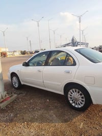 نيسان سني 2010 رقم سليمانيه الدولي صبغ شبر بالجاملغ الخلفي السعر 120$$...