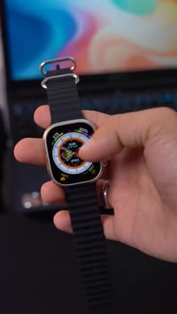 ساعة الترا • مقاس 49 • أسود/برتقالي