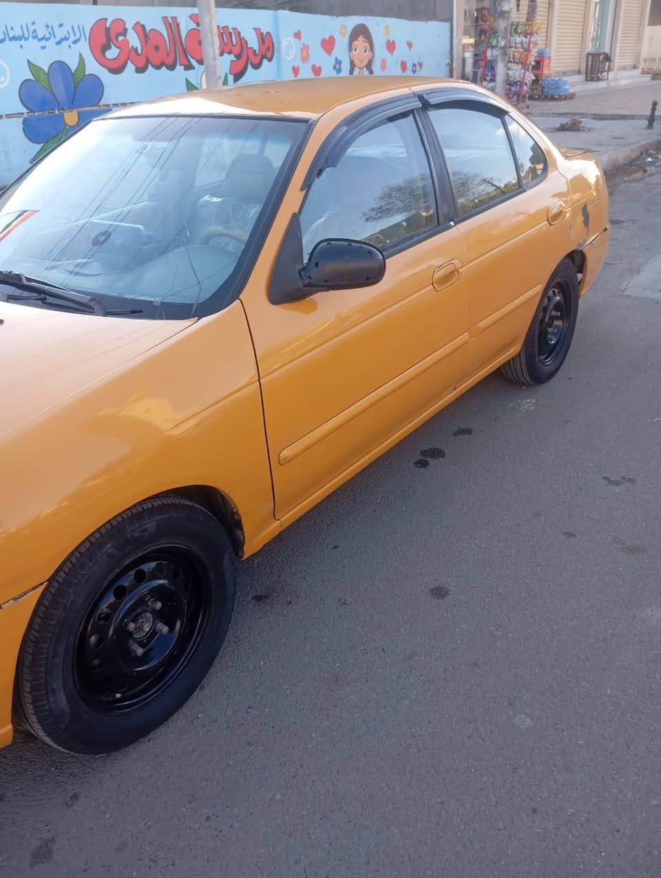 السلام عليكم سيارة نيسان سنترا 2005
السيارة جاهزة بس بيها نقص باور ستيرن 
بيه طخه بجاملغ الخلفي جه السائق
السعر 45 ورقة تحويل ثاني يوم
العنوان دورة بس اتصال على الرقم
0772 539 2055
