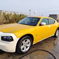 جارجر 2010 مكفوله من الضربه والتبديل مكينه وكير جدد حداده جديده تخم تا...