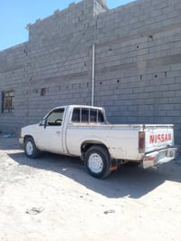 نيسان تك • ١٩٩٠ • رقم المثنى