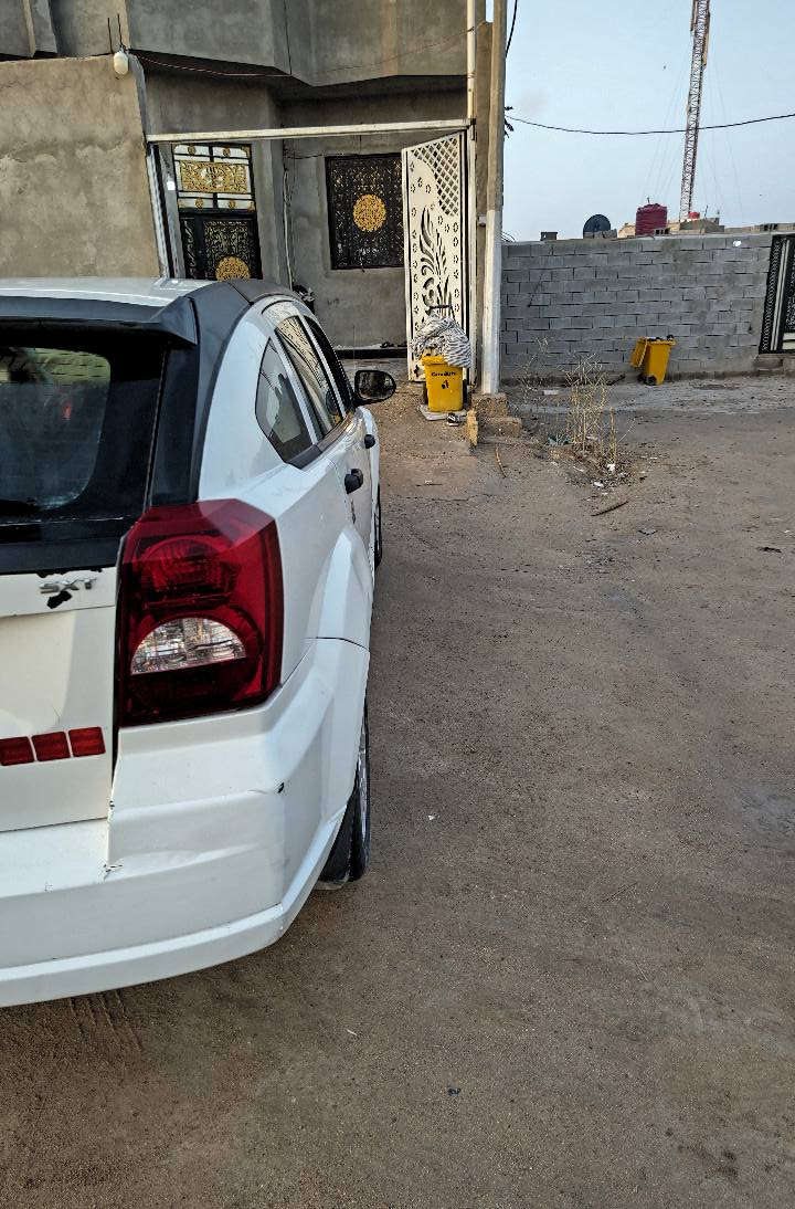 دوج كاليبر 2008 رقم بغداد مشروع وطني السياره بيهه كازكيد بس تمشي مكان السياره البصرة شط العرب رقم *********** واساب شط العرب, البصرة
