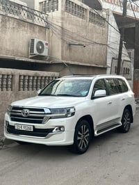 لاندكروز 2019 كراند تورنك بريم لون ابيض رقم بغداد السيارة بية صبغ الجا...