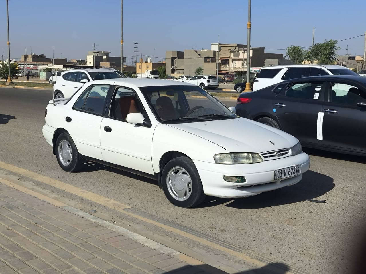 السلام عليكم 
 كيا سيفيه للبيع موديل 96
سيارة جاهزة كير مكينه كهربائيات كاملة
رقم بغداد دولي سنوية جديدة 
شرط التحويل 
سيارة سعرها 40 وبيها مجال
مكاني واسط الصويرة 
***********
